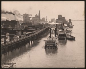 Mississippi Riverfront under oversvømmelse i 1890; detaljer om flodbåde.